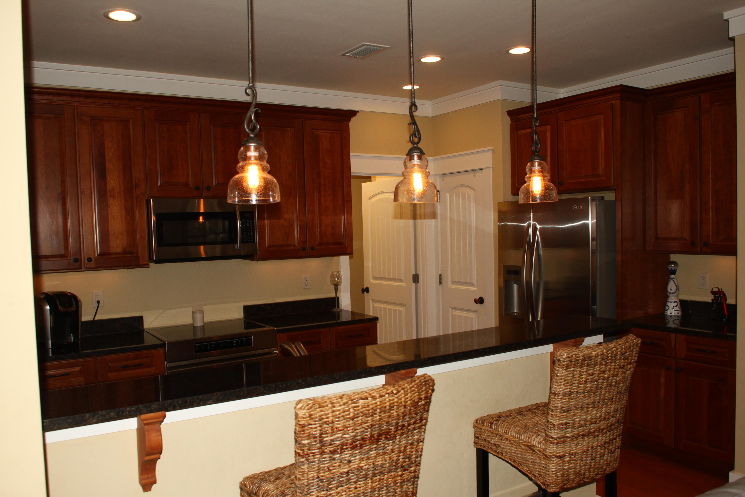 59 Willow Mist Road Inlet Beach, FL 32461 - Photo 8 of 22 a living room with furniture and a chandelier