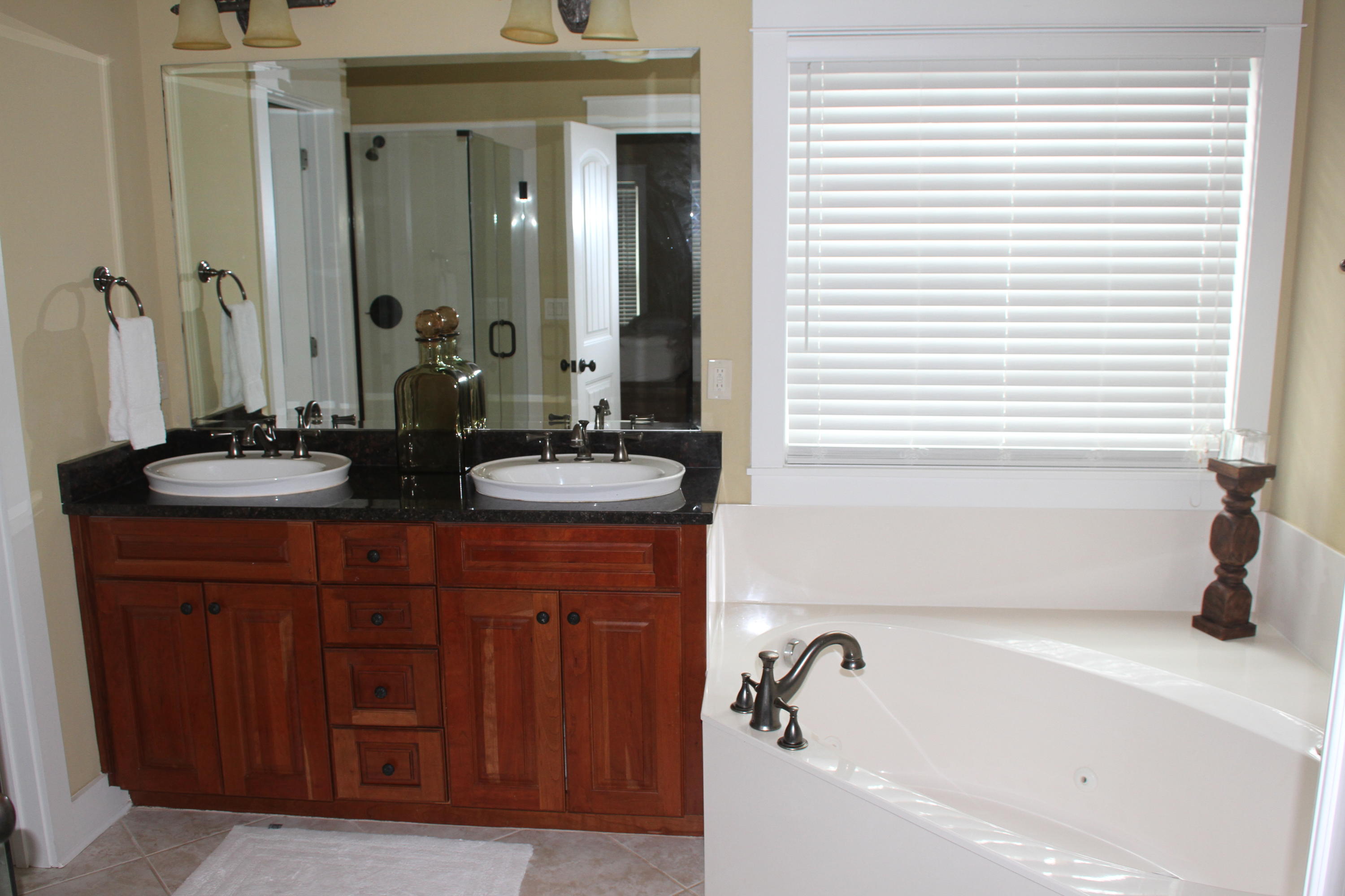59 Willow Mist Road Inlet Beach, FL 32461 - Photo 10 of 22 a bathroom with a tub sink and mirror