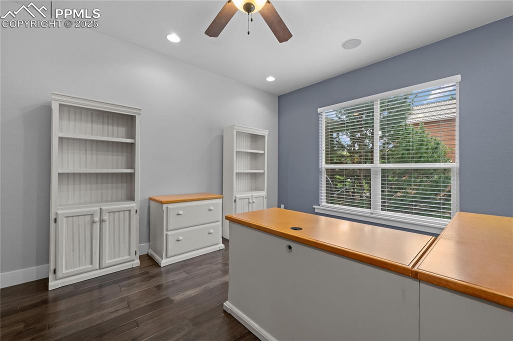 1069 Glengary Place Colorado Springs, CO 80921 - Photo 15 of 36 Office featuring dark wood-style floors, a ceiling fan, and recessed lighting