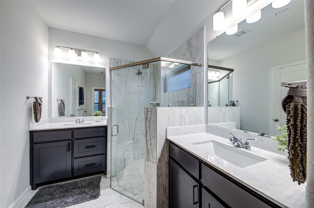 162 Palo Duro Bend Rhome, TX 76078 - Photo 16 of 25 Quartz countertops with double sinks and walk-in shower
