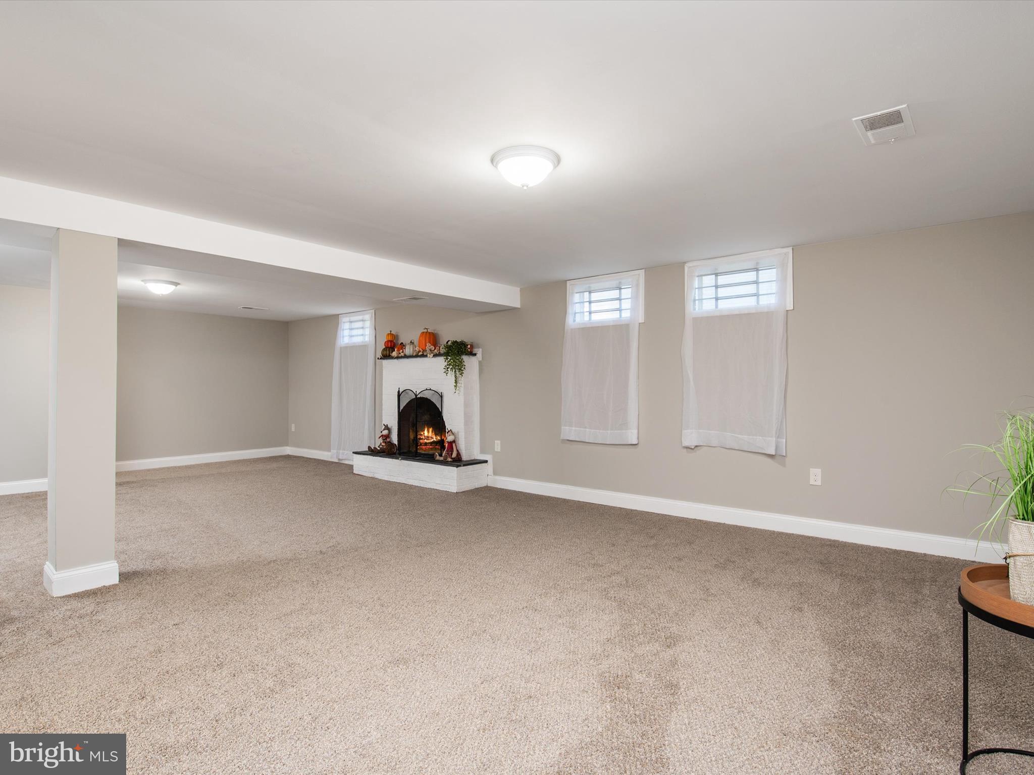 3957 Nemo Road Randallstown, MD 21133 - Photo 25 of 35 Warm cozy fireplace in the oversized family room
