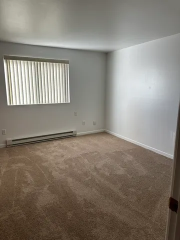an empty room with a window