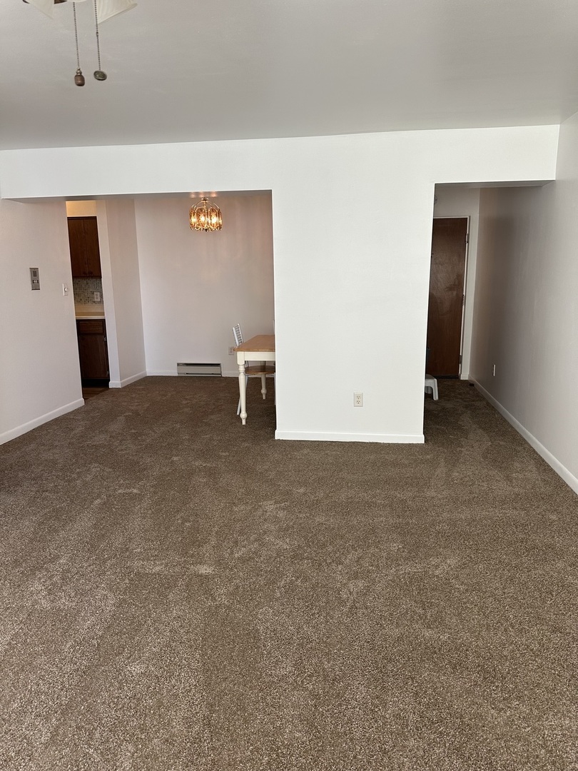 222 Madison Street, Unit 208 Joliet, IL 60435 - Photo 8 of 20 a view of an empty room