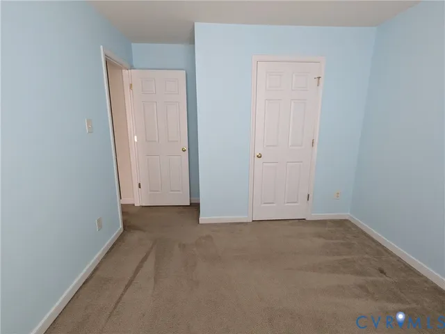an empty room with closet