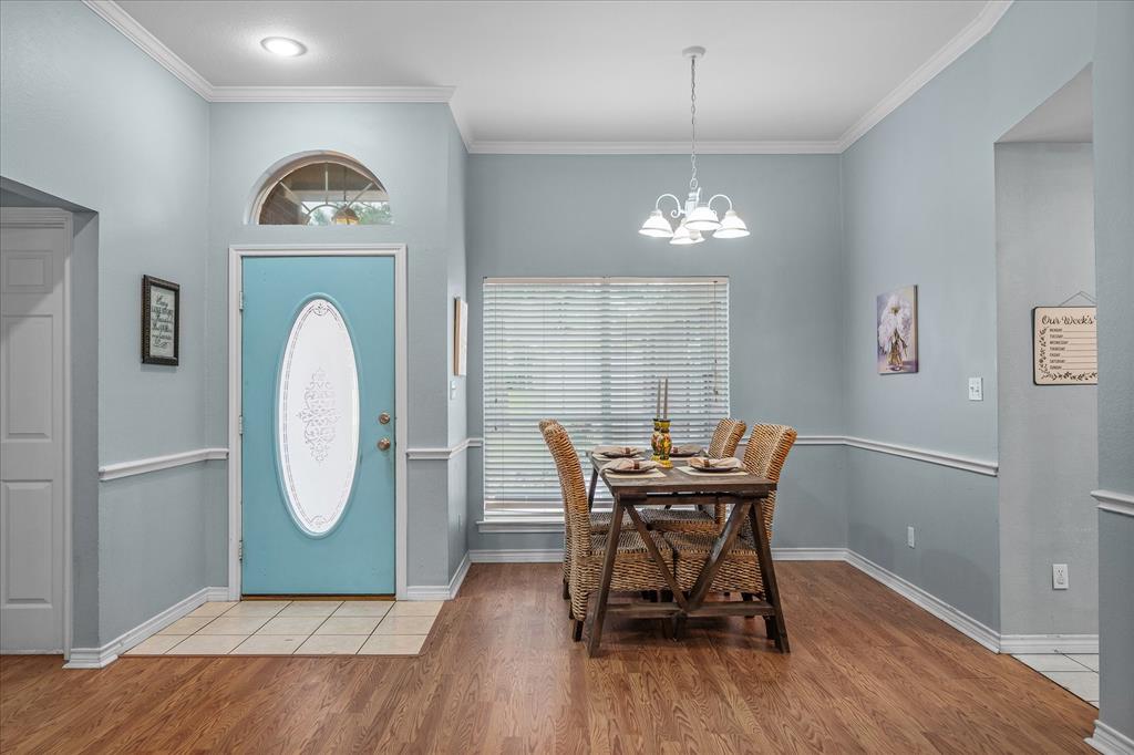 560 Washington Street Van, TX 75790 - Photo 11 of 29 a view of a dining room with furniture window and wooden floor