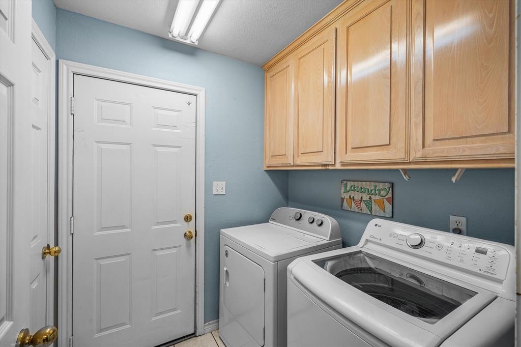 560 Washington Street Van, TX 75790 - Photo 16 of 29 a utility room with dryer and washer
