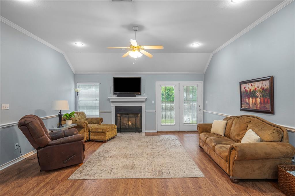 560 Washington Street Van, TX 75790 - Photo 17 of 29 a living room with furniture and a fireplace