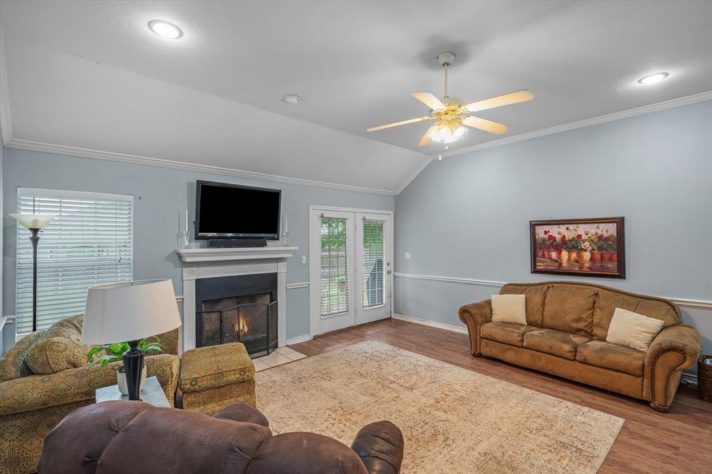 560 Washington Street Van, TX 75790 - Photo 19 of 29 a living room with furniture a fireplace and a flat screen tv