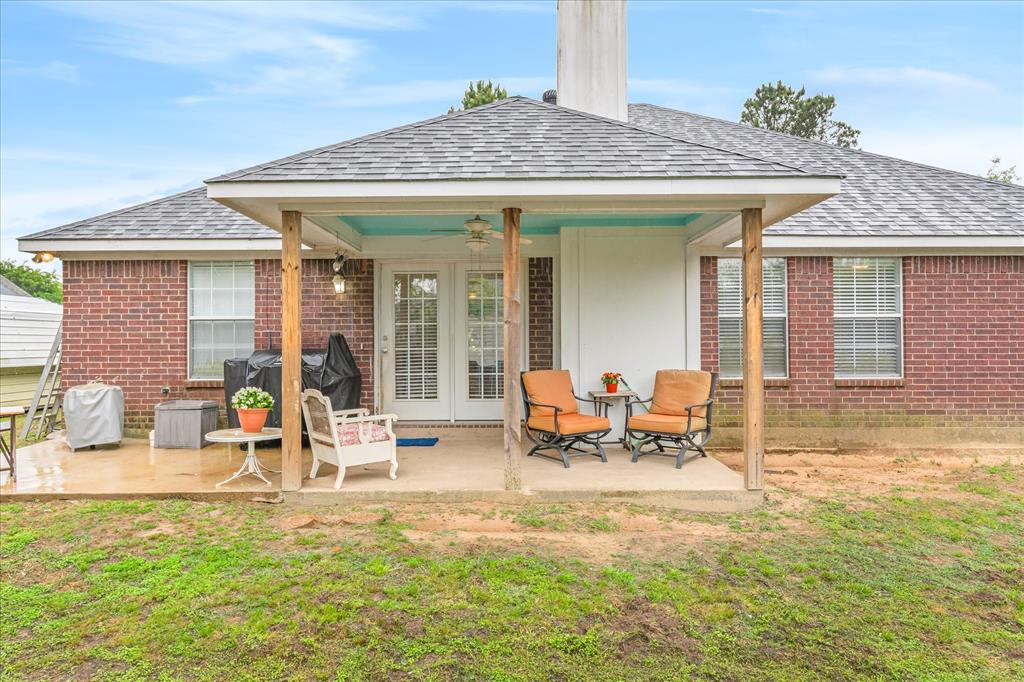 560 Washington Street Van, TX 75790 - Photo 24 of 29 a view of a house with backyard porch and sitting area