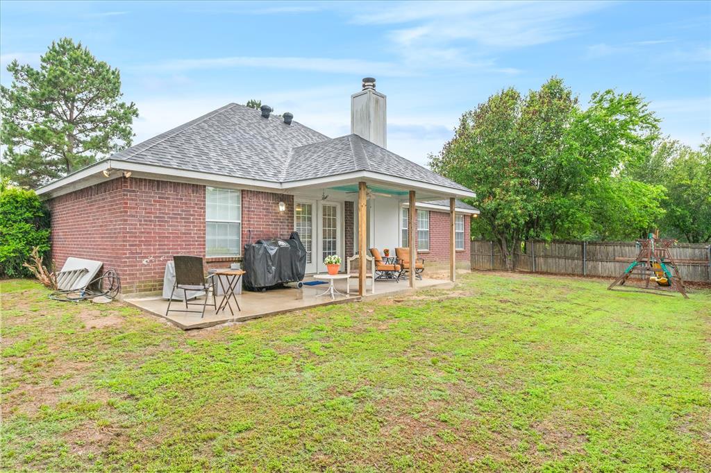 560 Washington Street Van, TX 75790 - Photo 26 of 29 a view of a house with backyard porch and sitting area