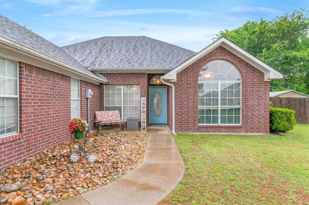 560 Washington Street Van, TX 75790 - Photo 5 of 29 a front view of a house with a porch