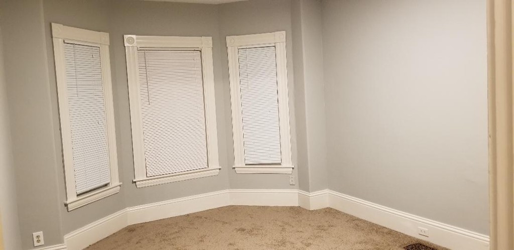 29 Lewis Street, Unit 2 Lynn, MA 01902 - Photo 11 of 22 an empty room with a window