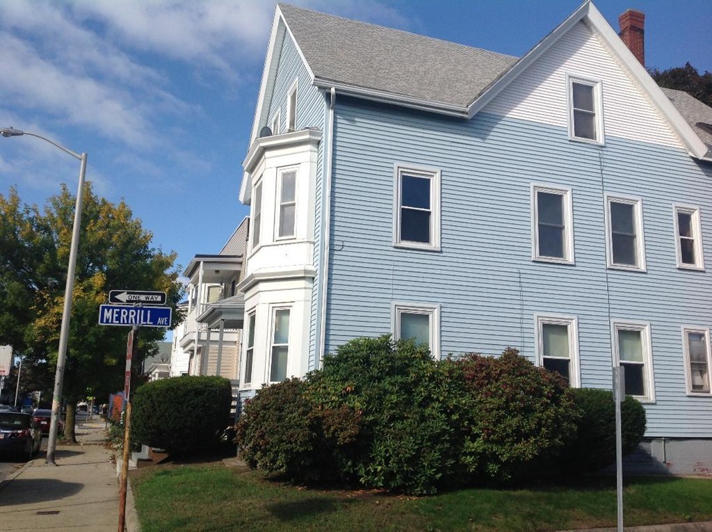 29 Lewis Street, Unit 2 Lynn, MA 01902 - Photo 2 of 22 a front view of a house with a yard