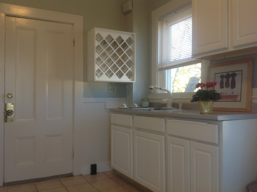 29 Lewis Street, Unit 2 Lynn, MA 01902 - Photo 5 of 22 a kitchen with cabinets and window