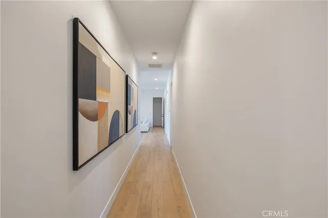 a bedroom with double bed and a window
