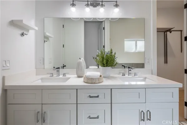 a spacious bathroom with a bathtub and toilet