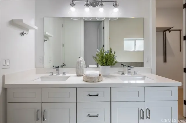 a spacious bathroom with a bathtub and toilet