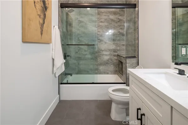 a view of a bathroom from the hallway