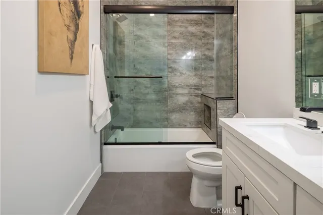 a view of a bathroom from the hallway