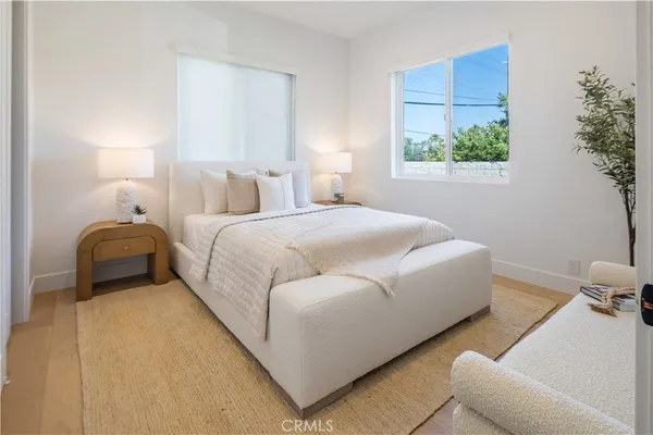 a view of living room with furniture and a window
