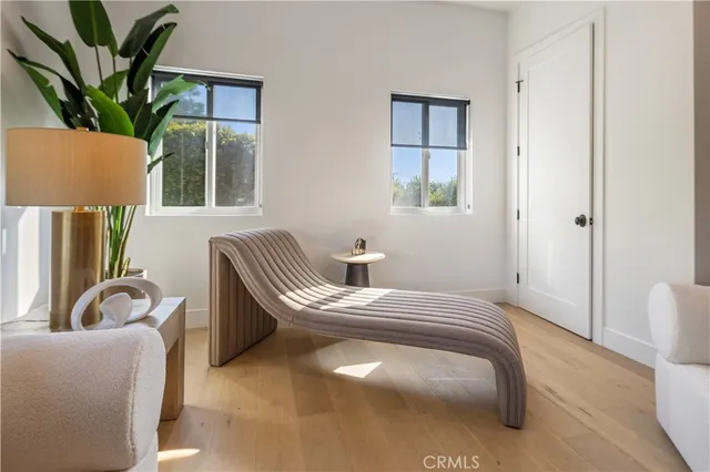 a white toilet sitting next to a bath tub shower