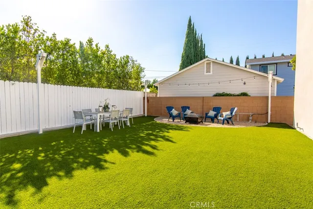 a view of swimming pool with seating space