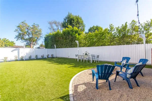 a view of a backyard with a garden