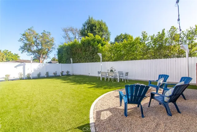 a view of a backyard with a garden