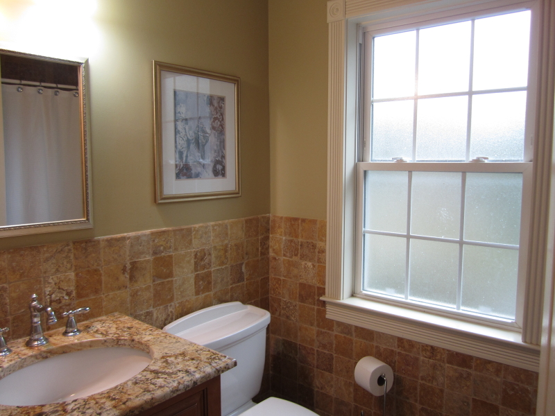 67 New England Avenue, Unit F Summit, NJ 07901 - Photo 12 of 16 a bathroom with a granite countertop sink and a mirror