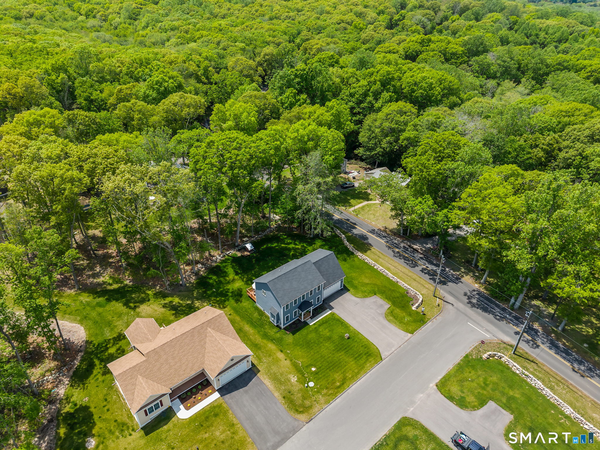 2 Martys Way Gales Ferry, CT 06335 - Photo 39 of 40 an aerial view of a house with a swimming pool
