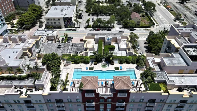 a view of swimming pool with outdoor seating