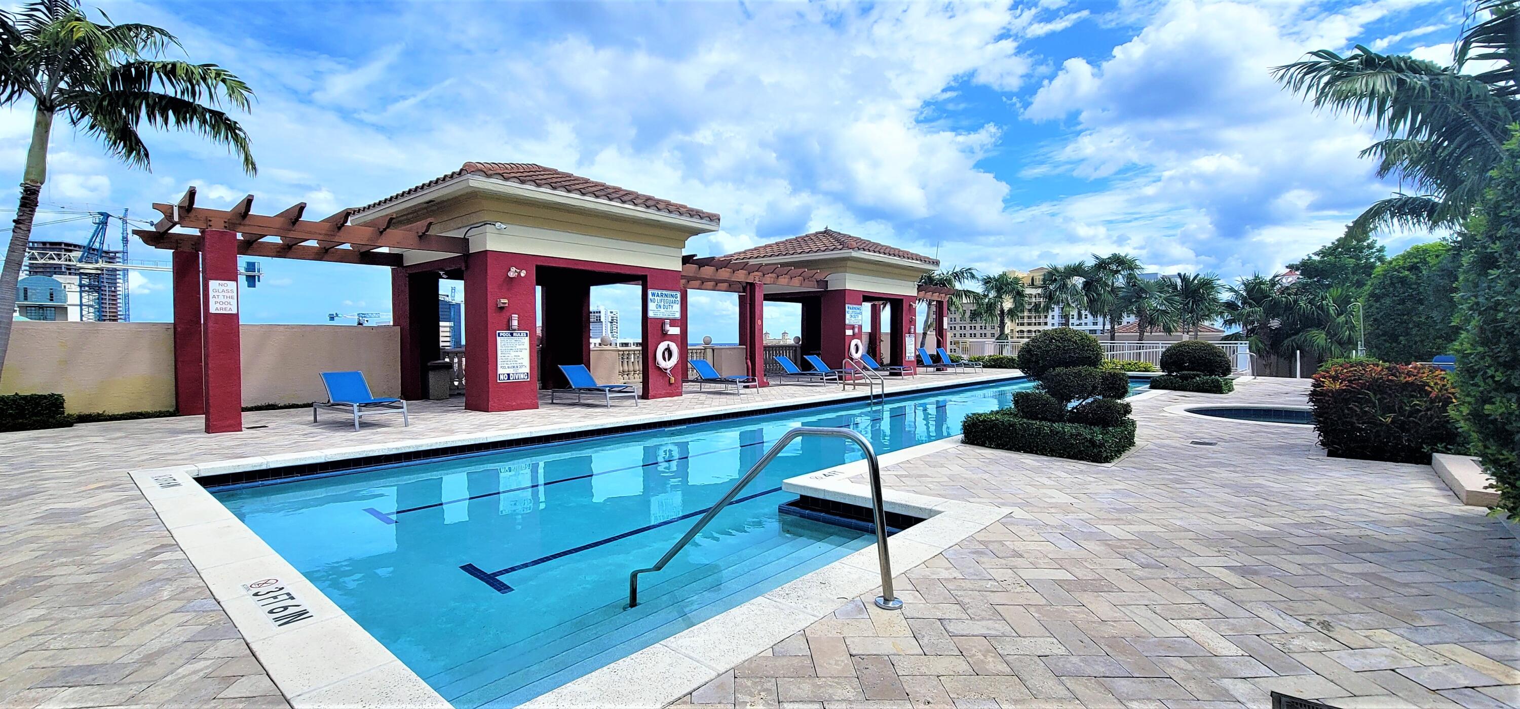 410 Evernia Street, Unit 616 West Palm Beach, FL 33401 - Photo 13 of 23 a view of swimming pool with outdoor seating