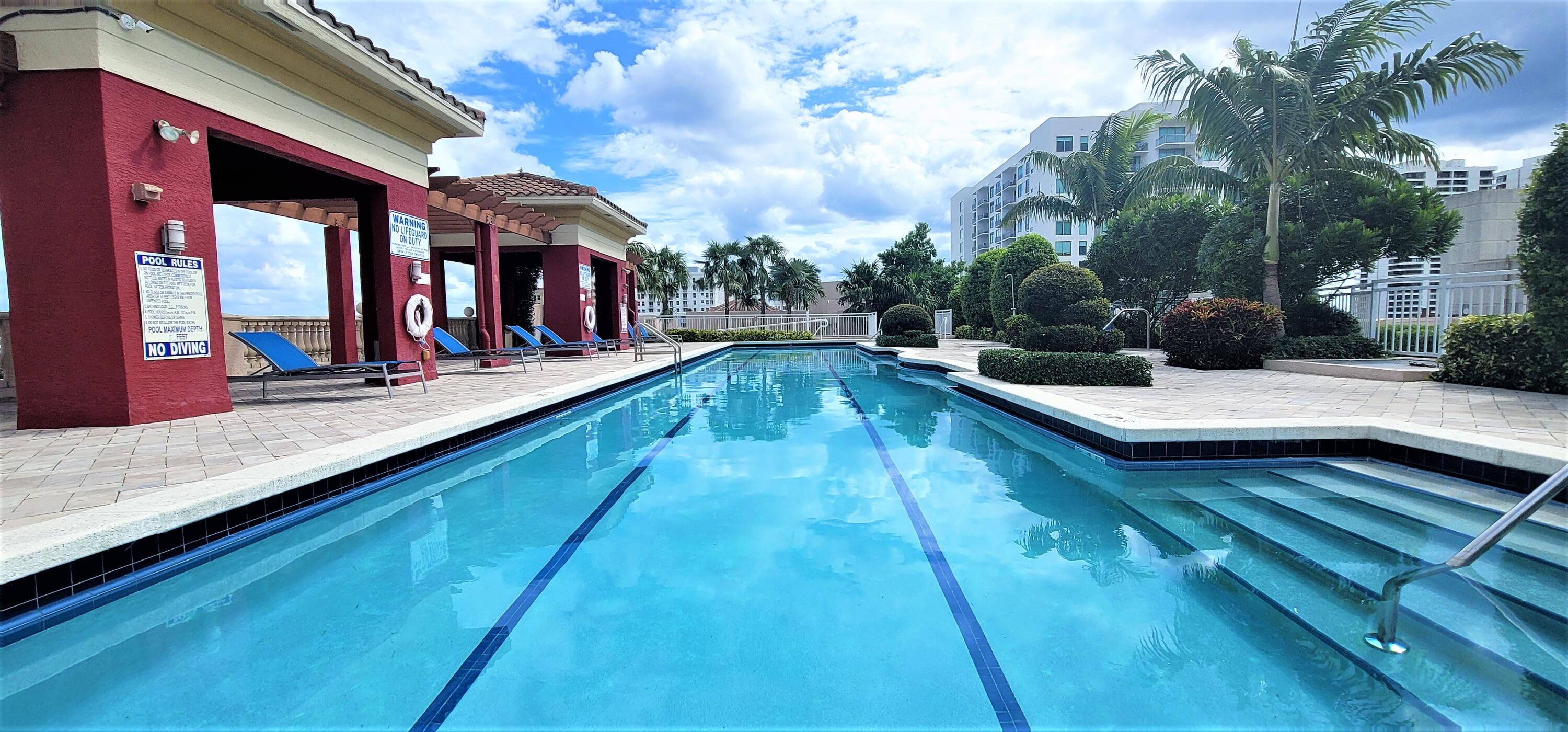410 Evernia Street, Unit 616 West Palm Beach, FL 33401 - Photo 14 of 23 a view of a house with swimming pool