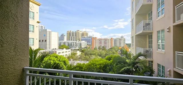 a view of a city with tall buildings