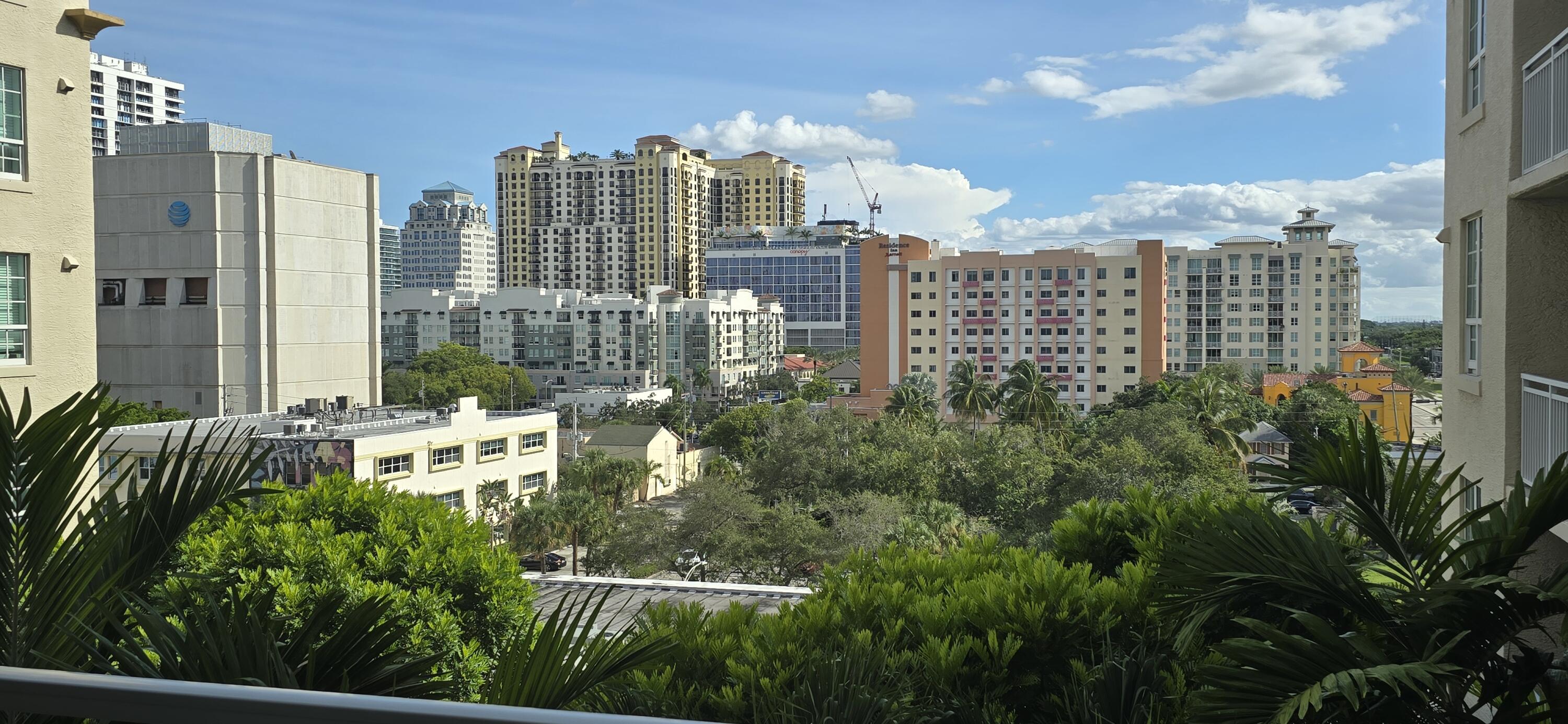 410 Evernia Street, Unit 616 West Palm Beach, FL 33401 - Photo 22 of 23 a view of a city with tall buildings