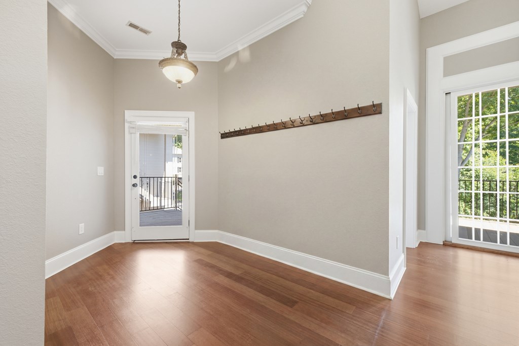 2143 Ridgecrest Circle, Unit 1 Hiawassee, GA 30546 - Photo 29 of 53 an empty room with wooden floor fan and windows