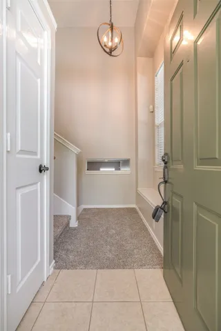 a view of a bathroom with a glass door shower