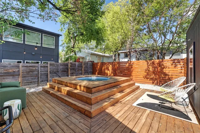 a view of a wooden deck with a bench