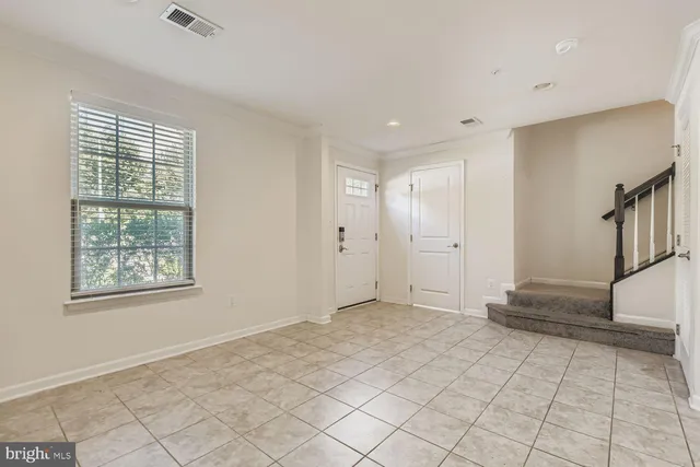 a view of an empty room with window