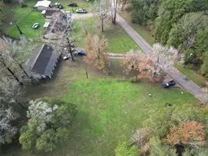 an aerial view of residential house with outdoor space