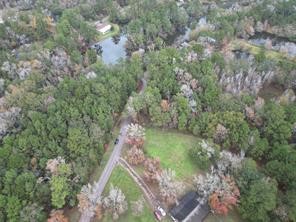 3307 Hamilton Circle Conroe, TX 77304 - Photo 9 of 16 a yard with a house and trees all around