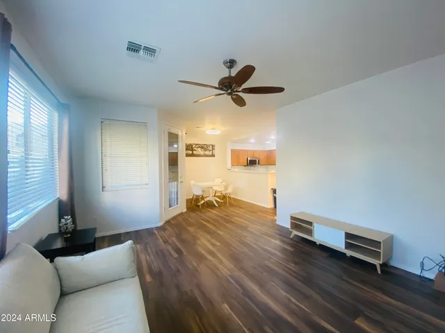 a bed room with a bed and a window