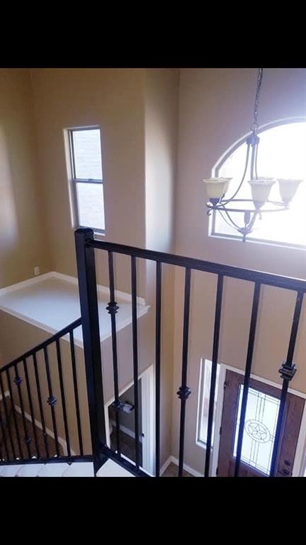 1118 Elk Ridge Drive Stephenville, TX 76401 - Photo 14 of 40 a view of staircase with black and white floor