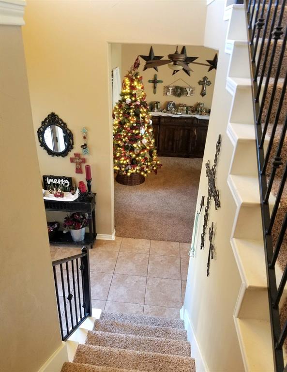1118 Elk Ridge Drive Stephenville, TX 76401 - Photo 19 of 40 a view of a livingroom with furniture and a rug