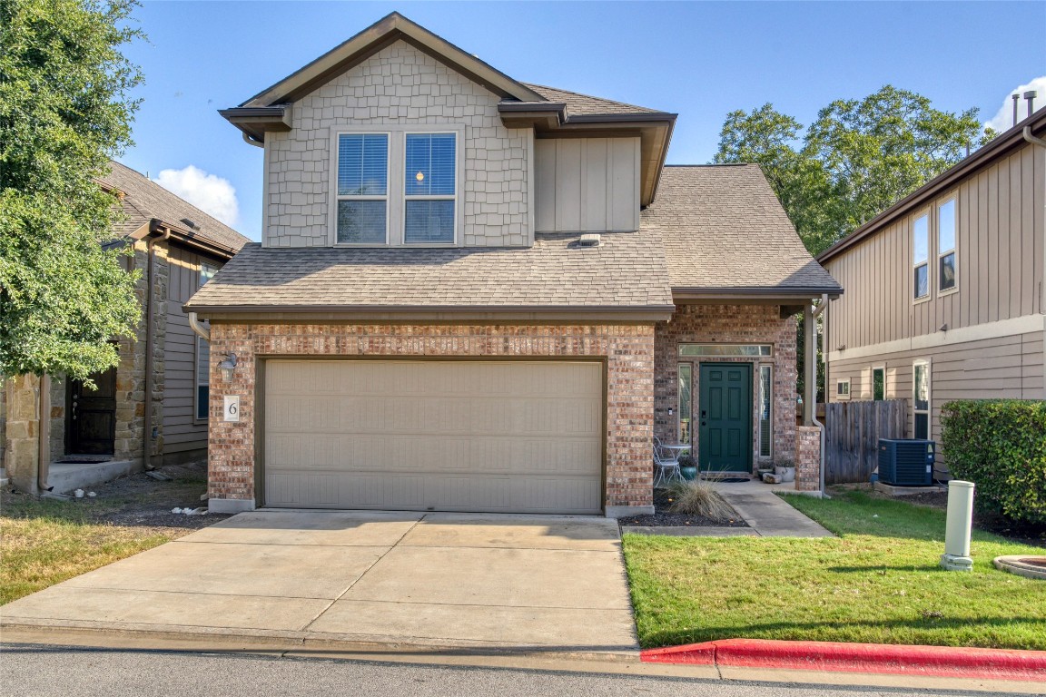 7337 Menchaca Road, Unit 6 Austin, TX 78745 - Photo 1 of 1 a front view of a house with garden