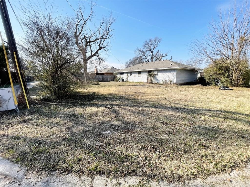 203 Abrams Road Richardson, TX 75081 - Photo 20 of 29 a view of a house with a yard