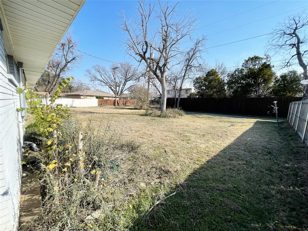 203 Abrams Road Richardson, TX 75081 - Photo 23 of 29 a view of backyard of the house