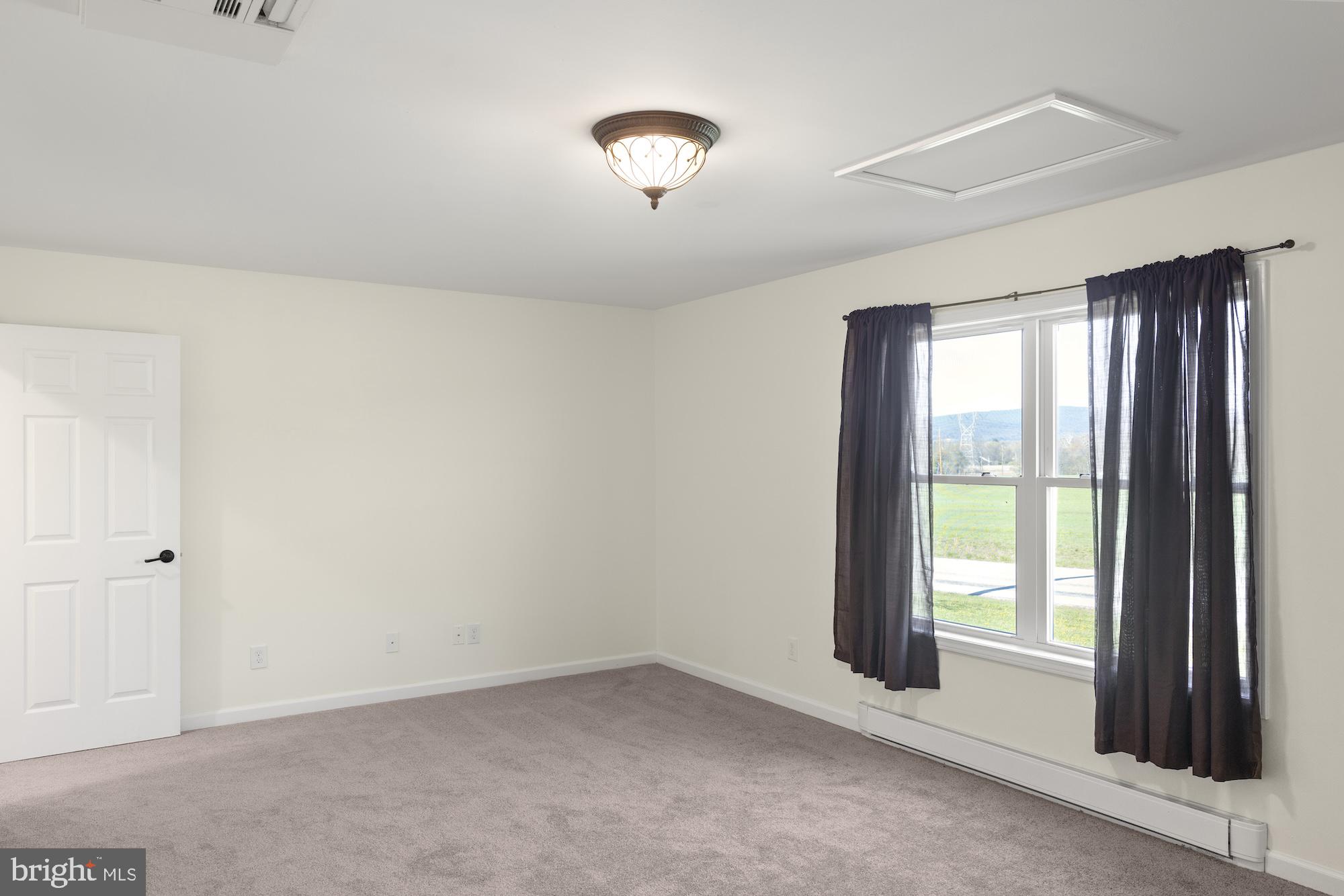 599 Hilltown Road Gettysburg, PA 17325 - Photo 31 of 49 an empty room with windows