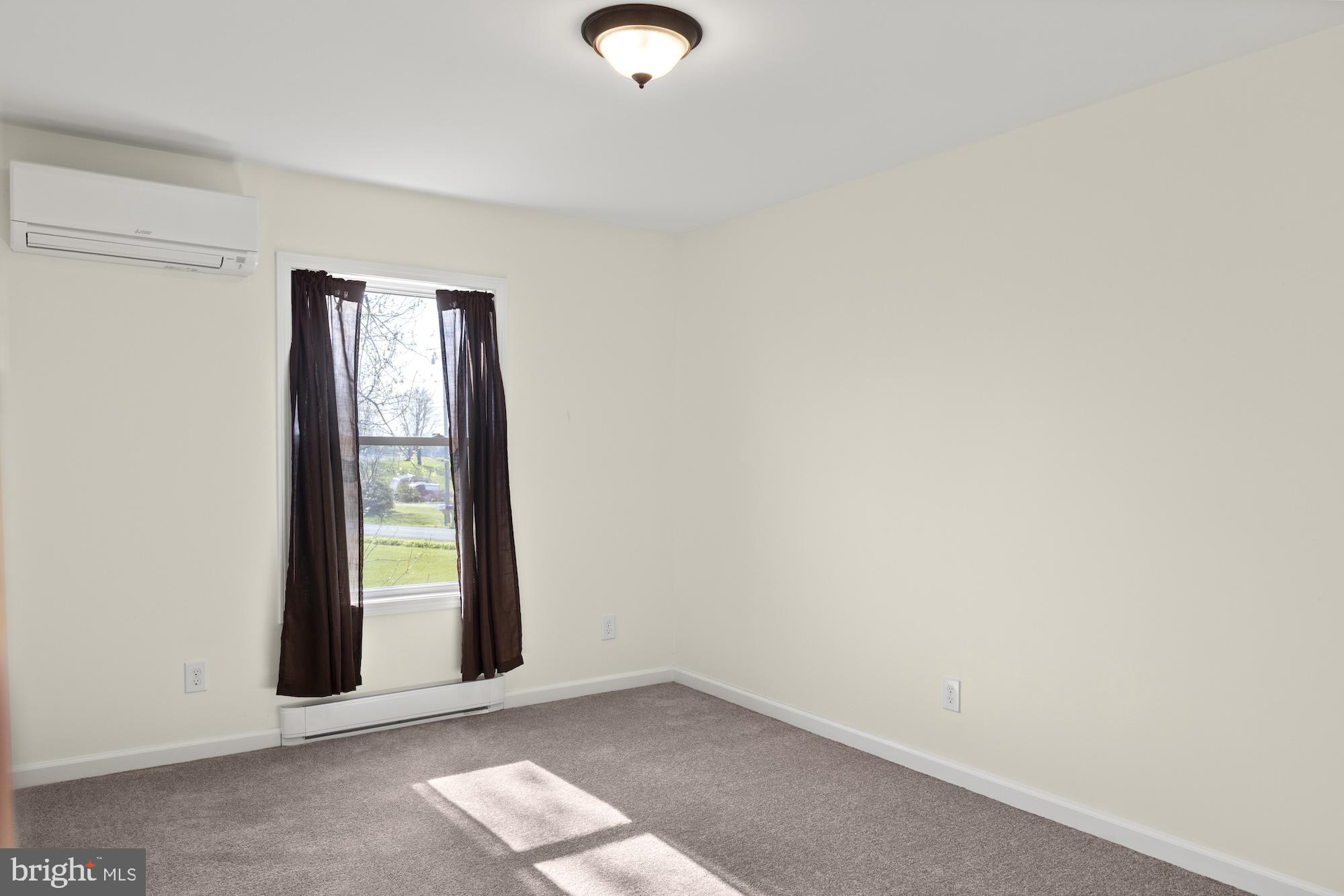 599 Hilltown Road Gettysburg, PA 17325 - Photo 32 of 49 an empty room with windows