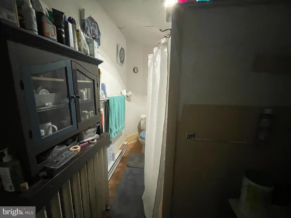a view of balcony and car parked